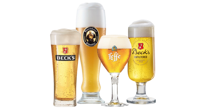 Vier Bierglässen von den Marken: BECK'S, Franziskaner, Leffe und BECK's Unfiltered
